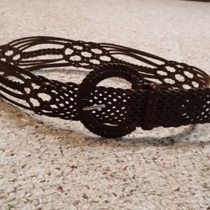 Brown leather belt for a woman.